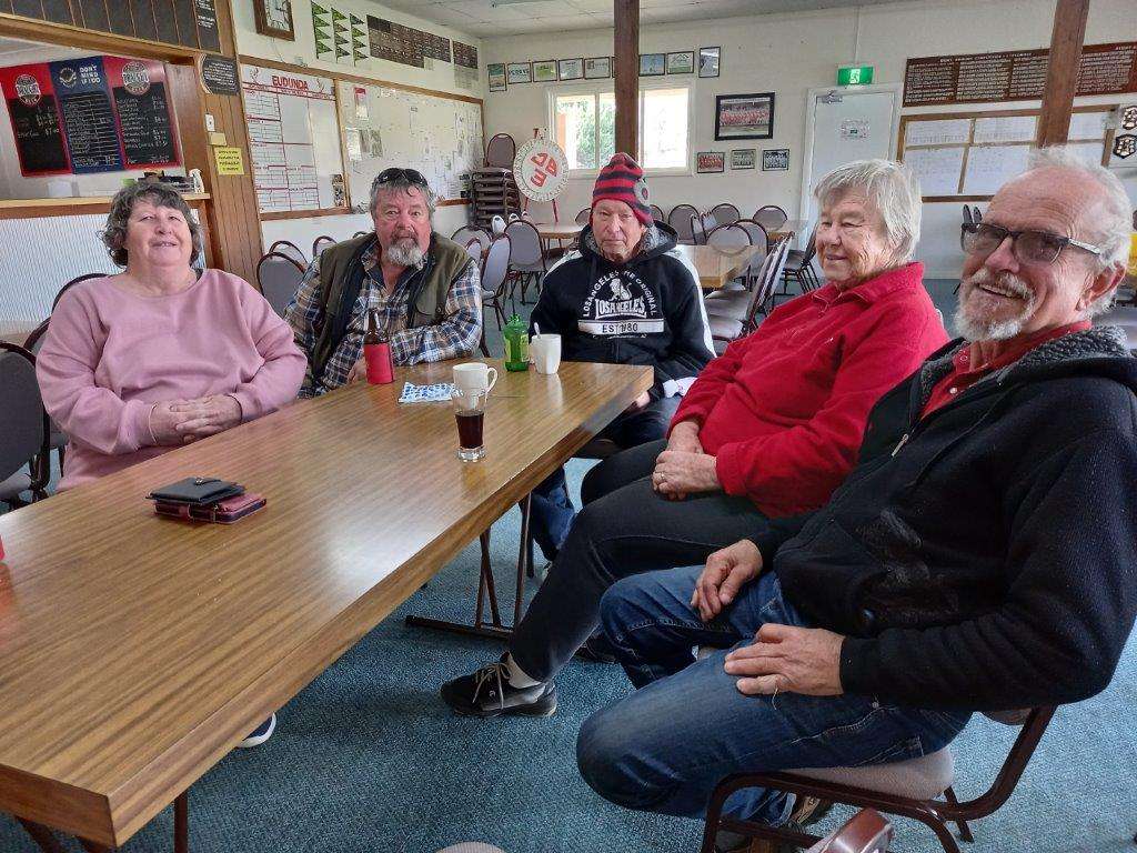 Dedicated bowlers at the Eudunda Bowling Club take a break after the tenth end