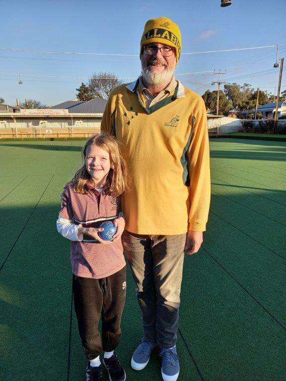 Josseline Cavanagh learning the art of bowling from her father Rob Cavanagh