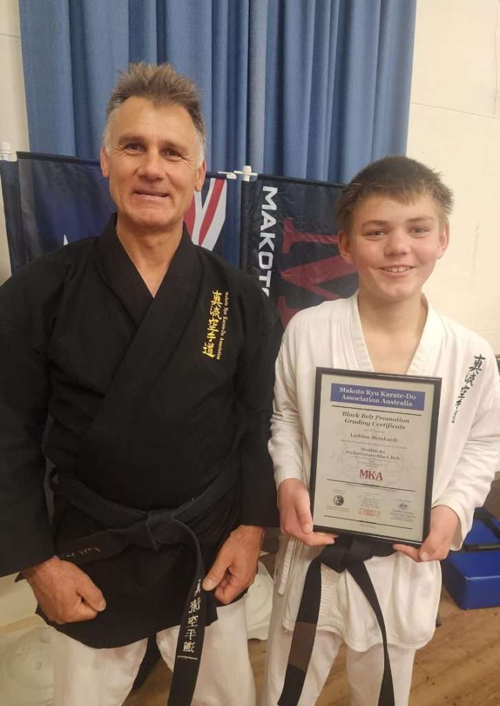 Proud Dad Greg with Lauchlan Meinhardt showing his certificate